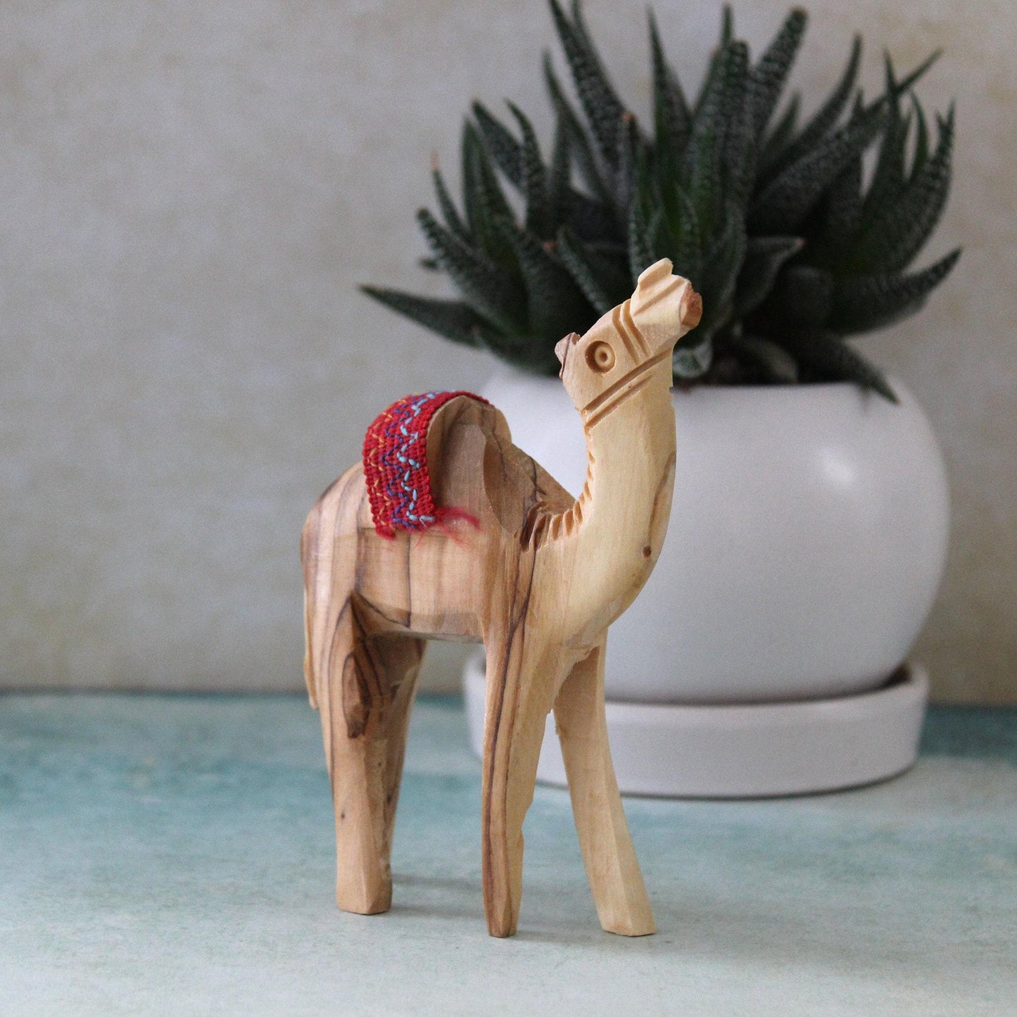 5.5" Olive Wood Camel Statue Hand Carved in the Holy Land Figurine Red Saddle. Handmade in the Holy Land, Jerusalem