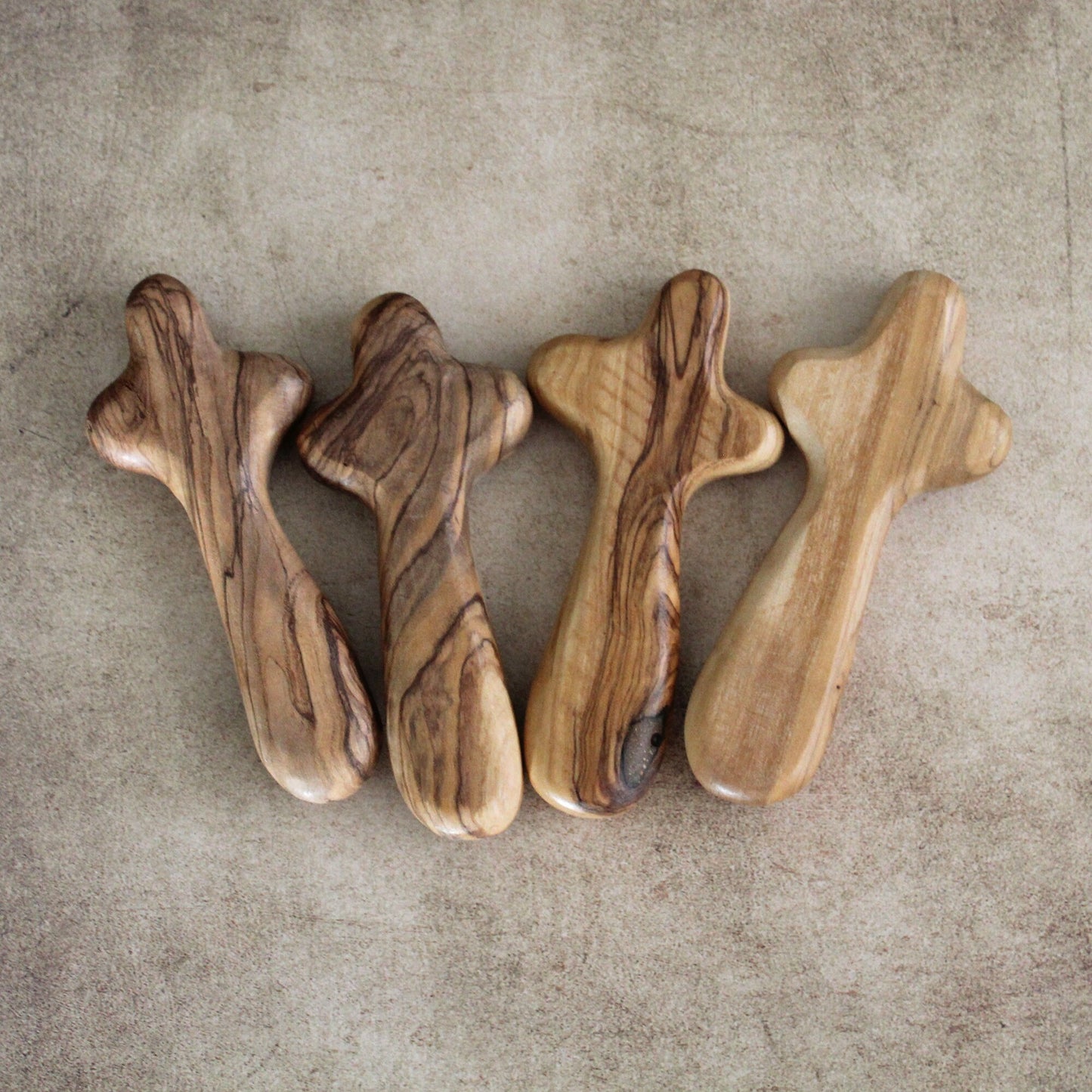 Bundle of 4 Handmade Comfort Crosses Also Called Palm Cross Made From Olive Wood in the Holy Land. Hand Carved Olive Wood Holding Crosses