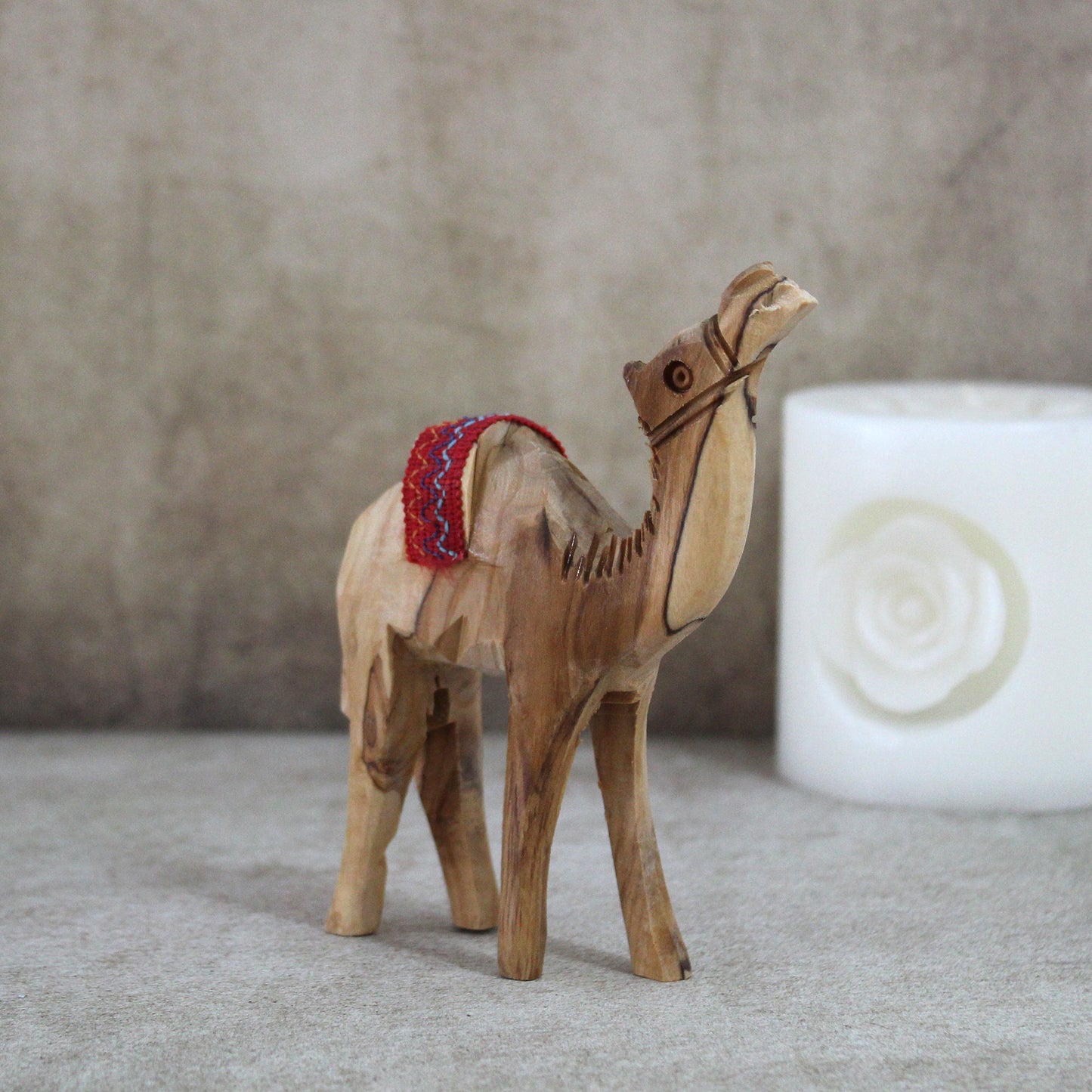 Olive Wood Camel Statue Hand Carved in Holy Land Figurine Red Saddle. Hand Made in Holy Land Jerusalem, 8x11 centimeters