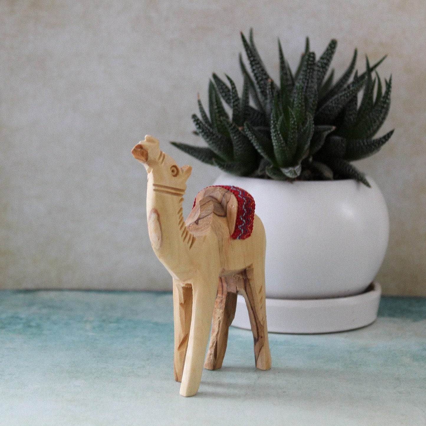 5.5" Olive Wood Camel Statue Hand Carved in the Holy Land Figurine Red Saddle. Handmade in the Holy Land, Jerusalem
