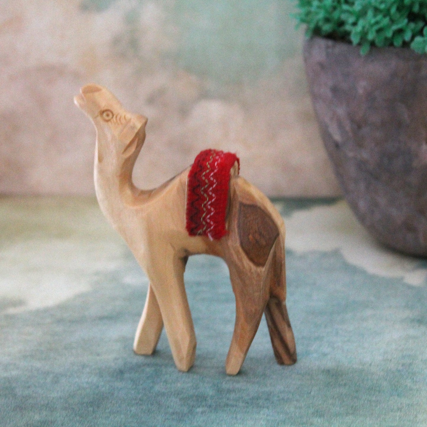 Olive Wood Camel Statue Hand Carved in Holy Land Figurine Red Saddle. Hand Made in Holy Land Jerusalem, 9x8 centimeters