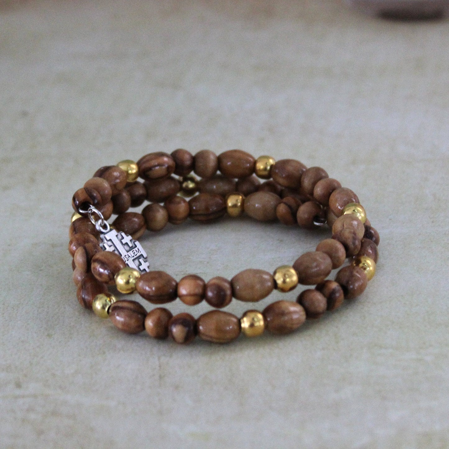 Get Two Beautiful Olive Wood Beads Bracelet With Silver Color Smaller Golden Beads and Jerusalem Cross Icon, Made in the Holy Land Jerusalem