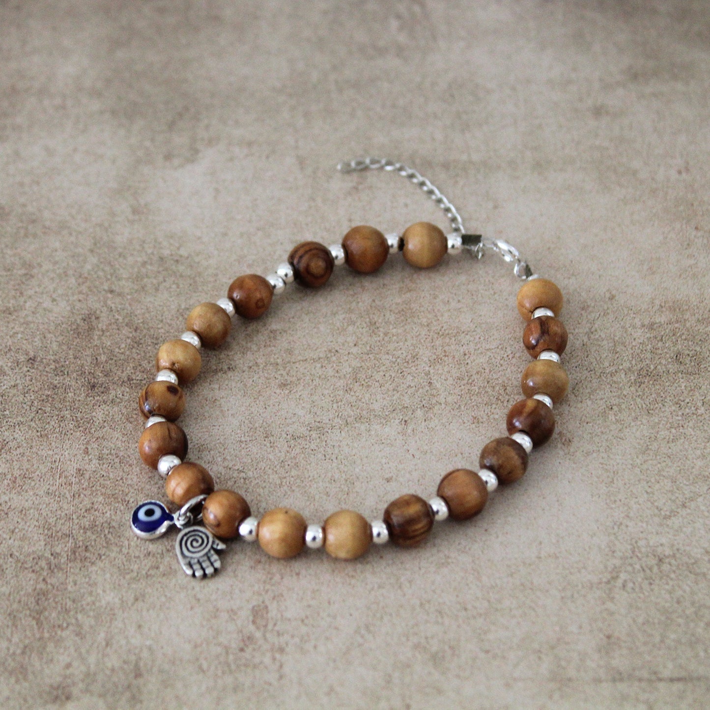 Sacred Sentinel: Artisan Evil Eye and Hamsa Hand Bracelet, a Symbolic Shield of Protection and Trendy Talisman Against Negativity