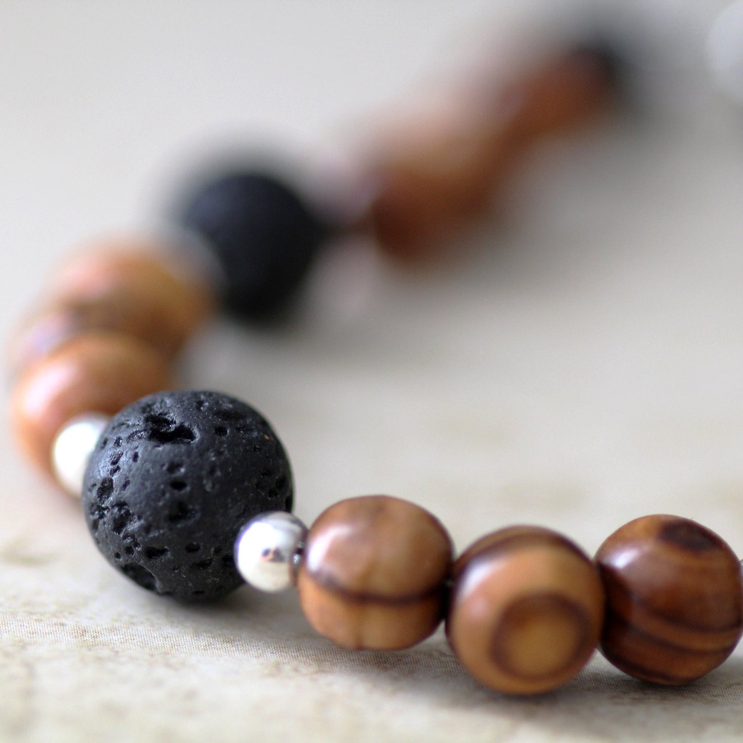 Olive Wood Beads & Black Volcanic Lava Stone Bracelet with Sterling Silver Accents - Handcrafted Statement Jewelry