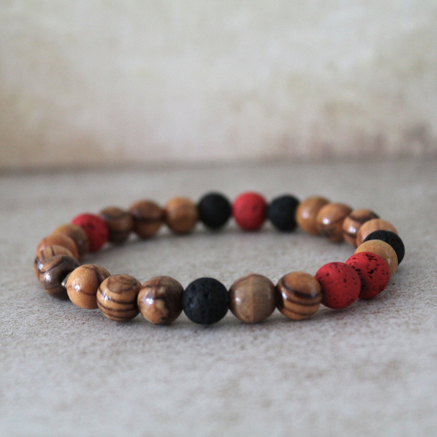 Handcrafted Hebrew Jewelry from Israel, Volcanic Lava Bracelet, Unisex Bracelet With Olive Wood Beads