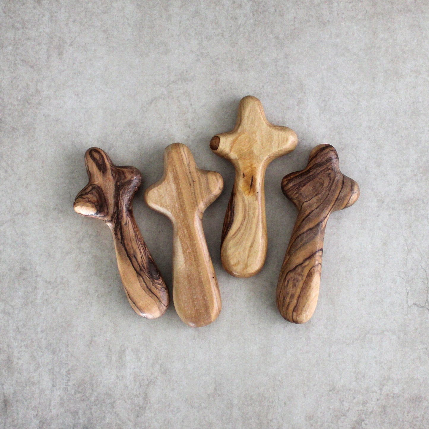 Bundle of 4 Handmade Comfort Crosses Also Called Palm Cross Made From Olive Wood in the Holy Land. Hand Carved Olive Wood Holding Crosses