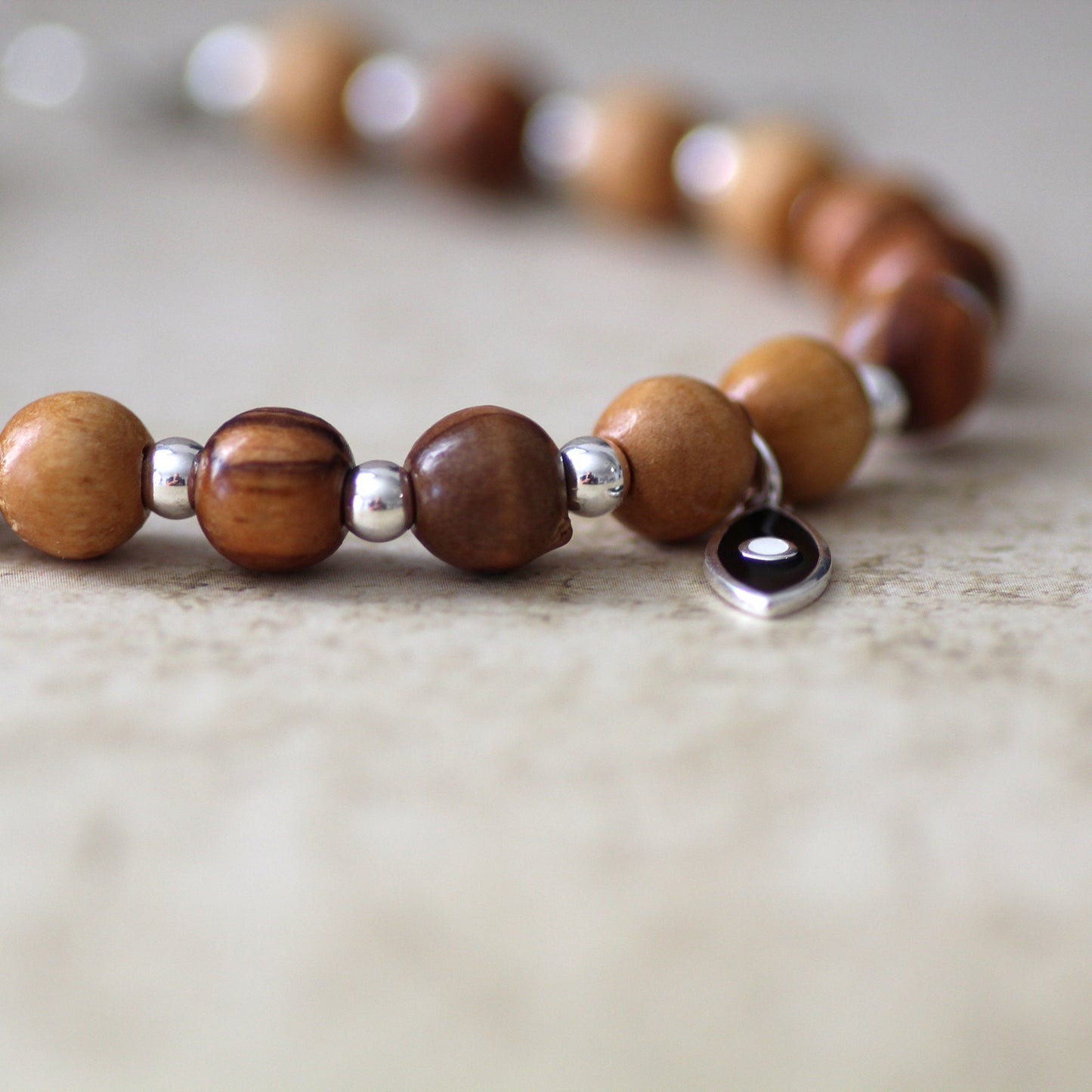 925 Silver and Olive Wood Beaded Bracelet with Black Fish Charm - Handcrafted Statement Jewelry