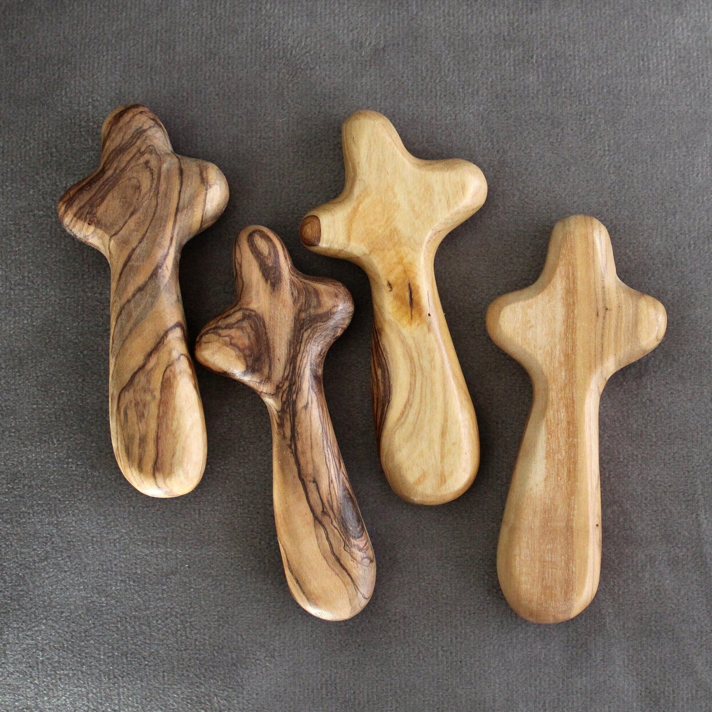 Bundle of 4 Handmade Comfort Crosses Also Called Palm Cross Made From Olive Wood in the Holy Land. Hand Carved Olive Wood Holding Crosses