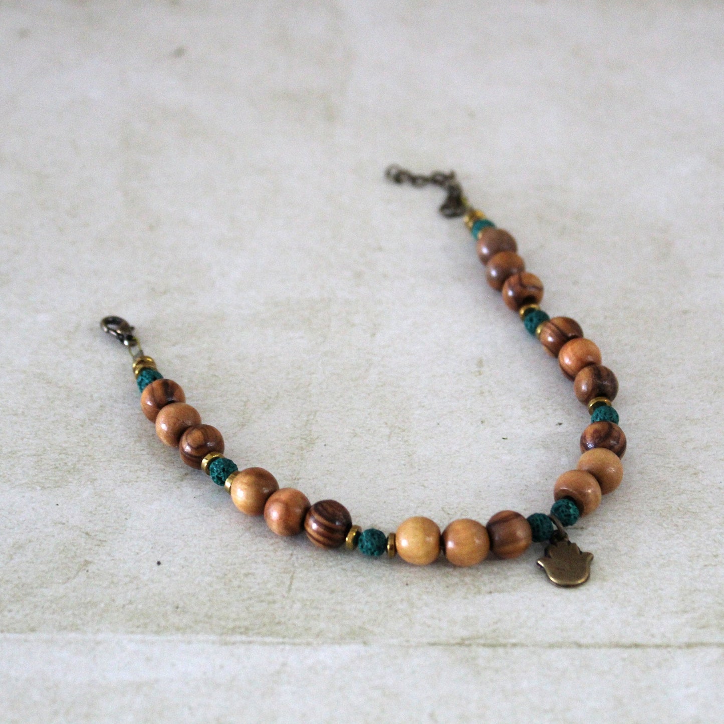 Love's Embrace: Turquoise Chakra Anklet - A Healing Gift for Him and Her, Handcrafted with Olive Wood and Lava Beads, Made in Israel