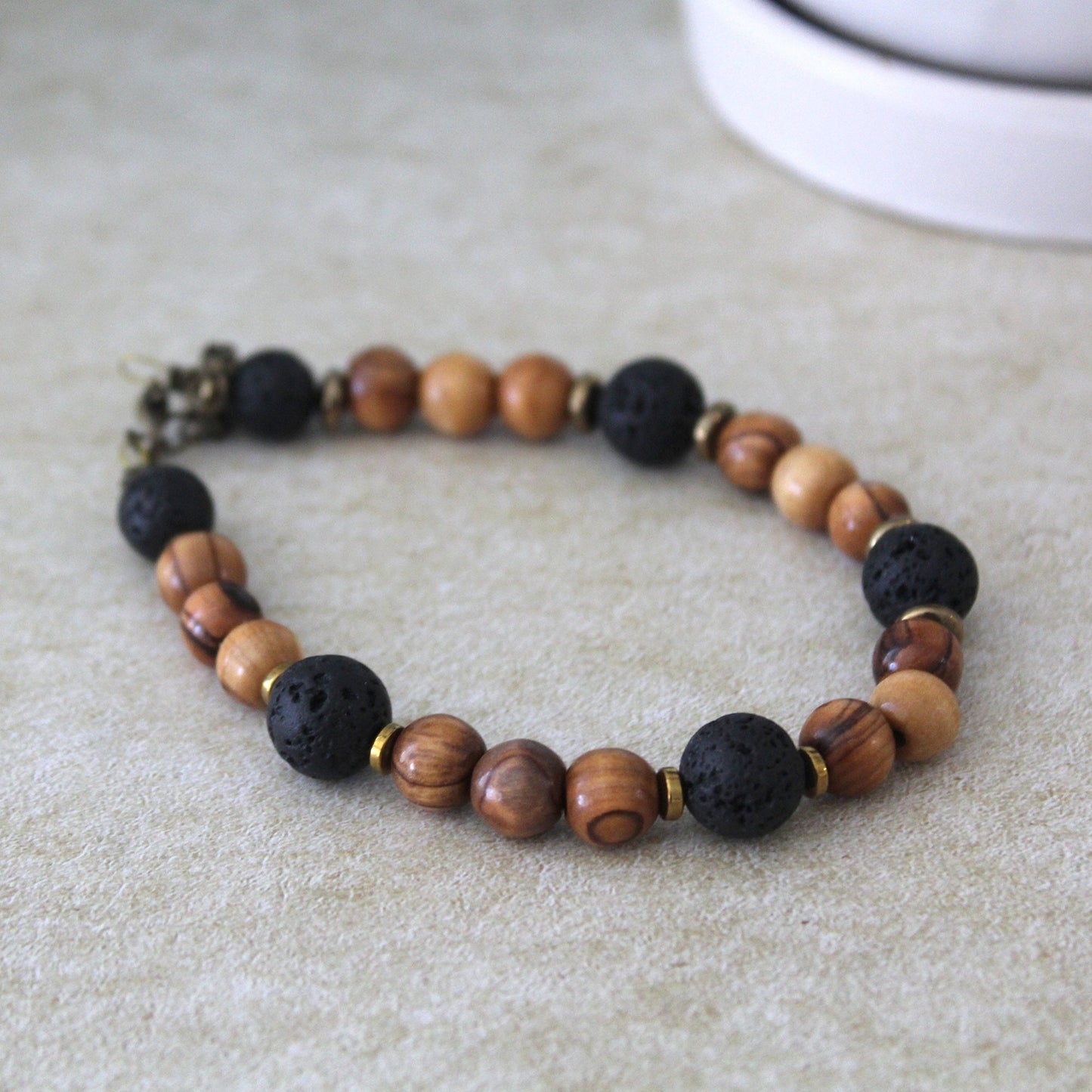 Divine Fusion: Handcrafted Hebrew Jewelry from Israel - Bar Mitzvah Blessings and Energy Charms with Olive Wood and Lava Stone