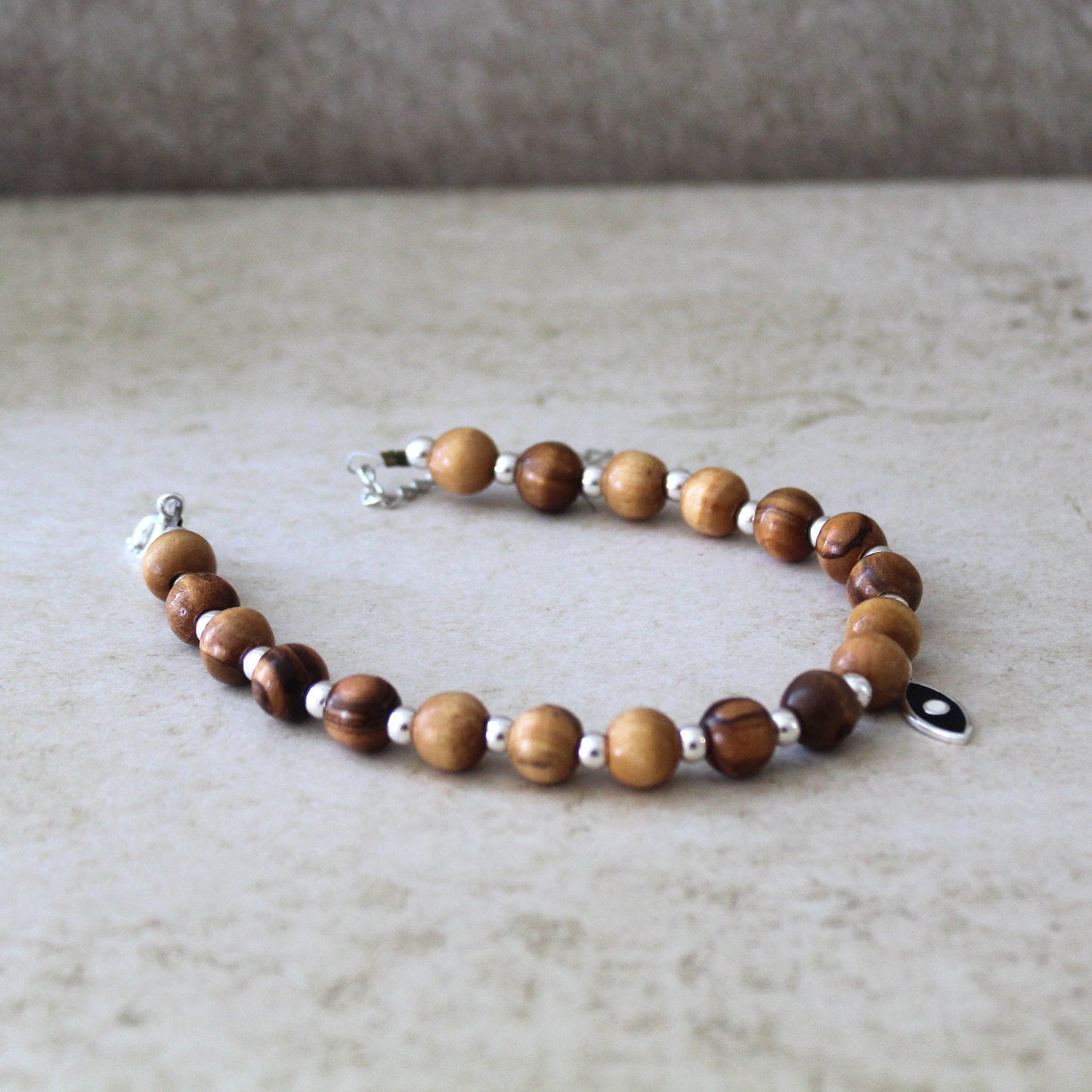 925 Silver and Olive Wood Beaded Bracelet with Black Fish Charm - Handcrafted Statement Jewelry
