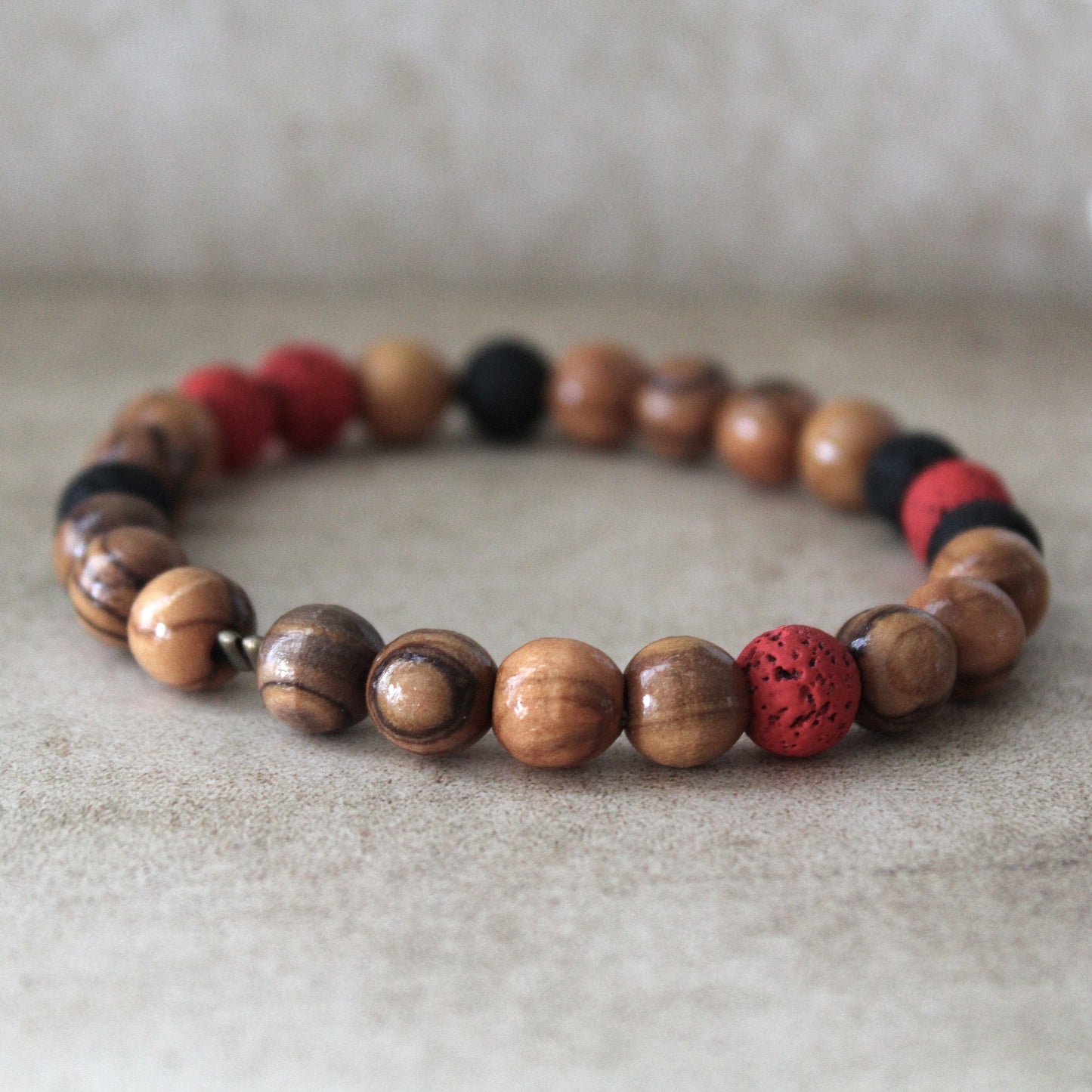 Handcrafted Hebrew Jewelry from Israel, Volcanic Lava Bracelet, Unisex Bracelet With Olive Wood Beads