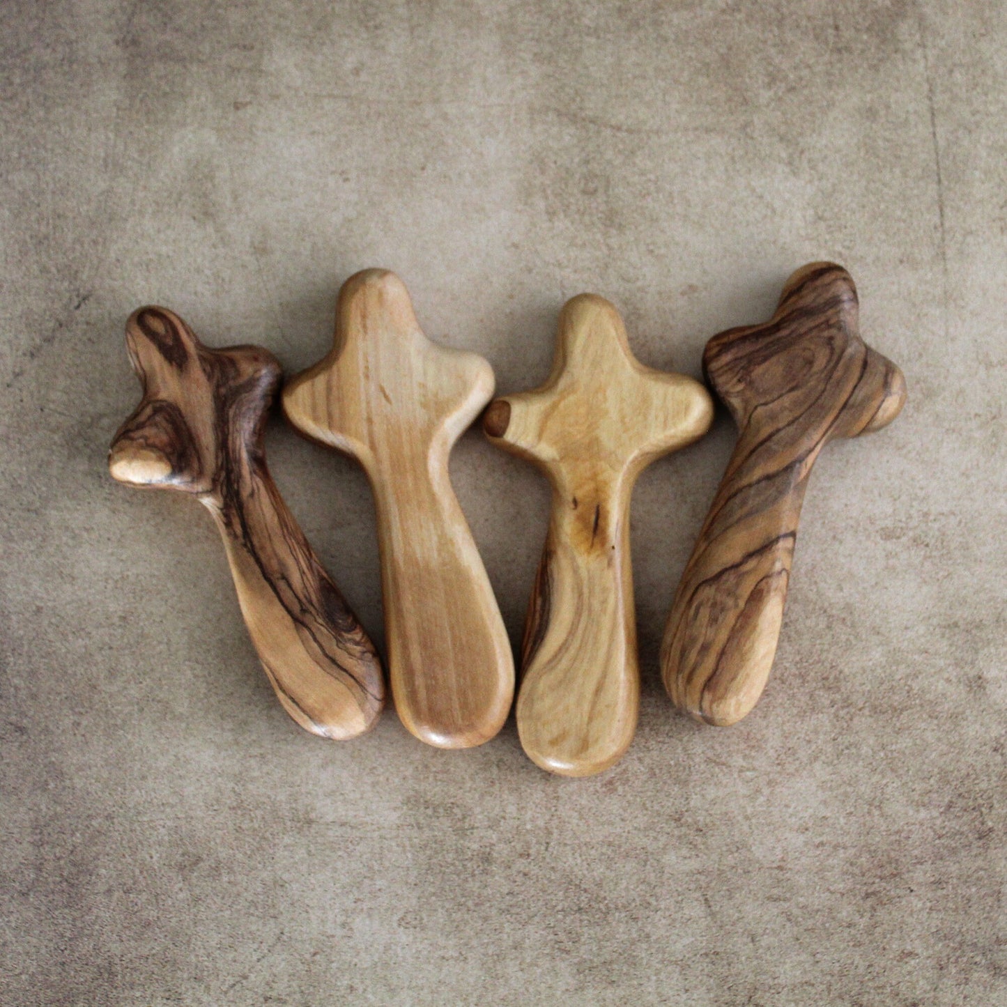 Bundle of 4 Handmade Comfort Crosses Also Called Palm Cross Made From Olive Wood in the Holy Land. Hand Carved Olive Wood Holding Crosses