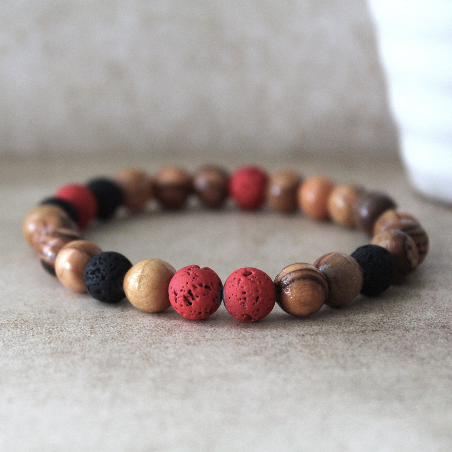 Handcrafted Hebrew Jewelry from Israel, Volcanic Lava Bracelet, Unisex Bracelet With Olive Wood Beads