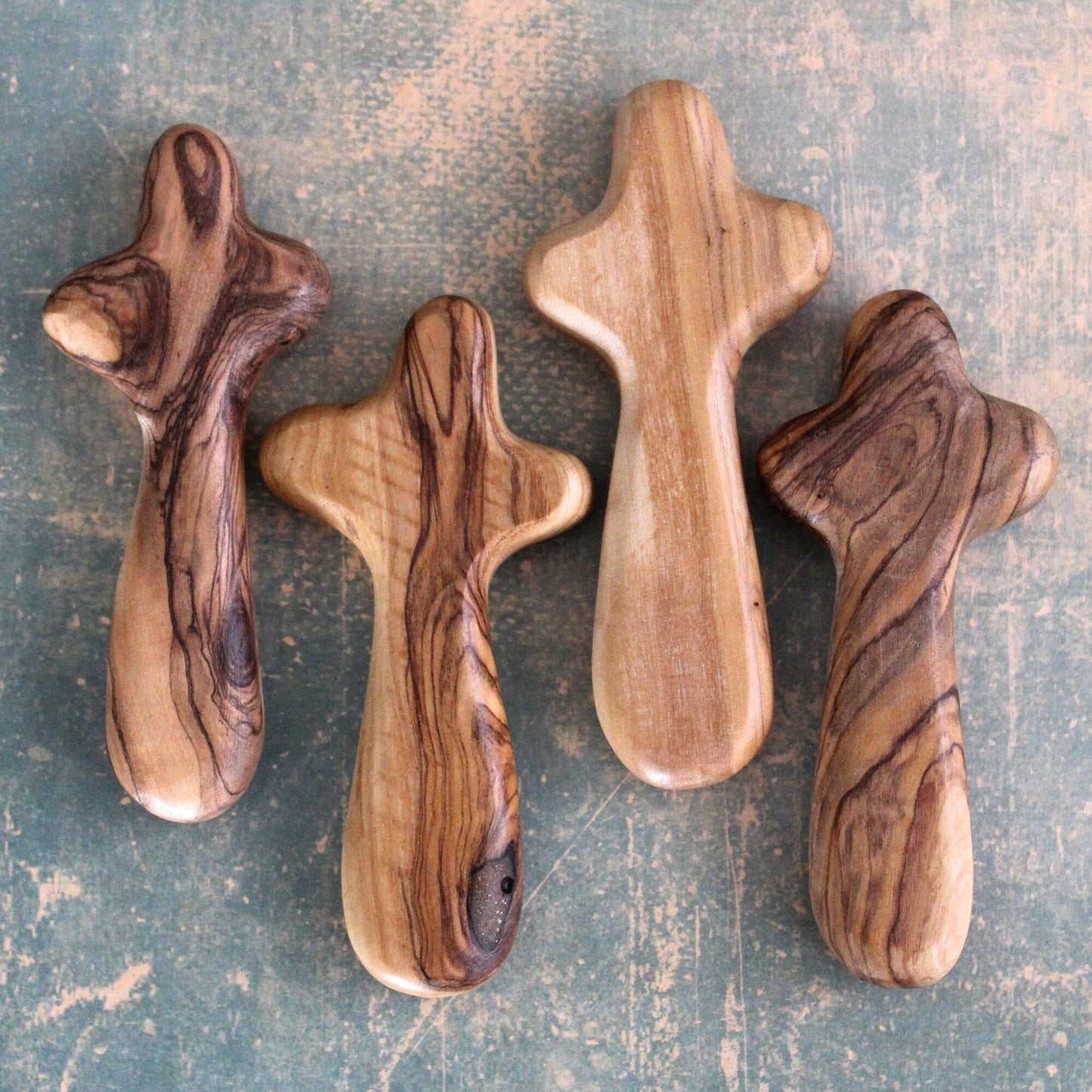 Bundle of 4 Handmade Comfort Crosses Also Called Palm Cross Made From Olive Wood in the Holy Land. Hand Carved Olive Wood Holding Crosses