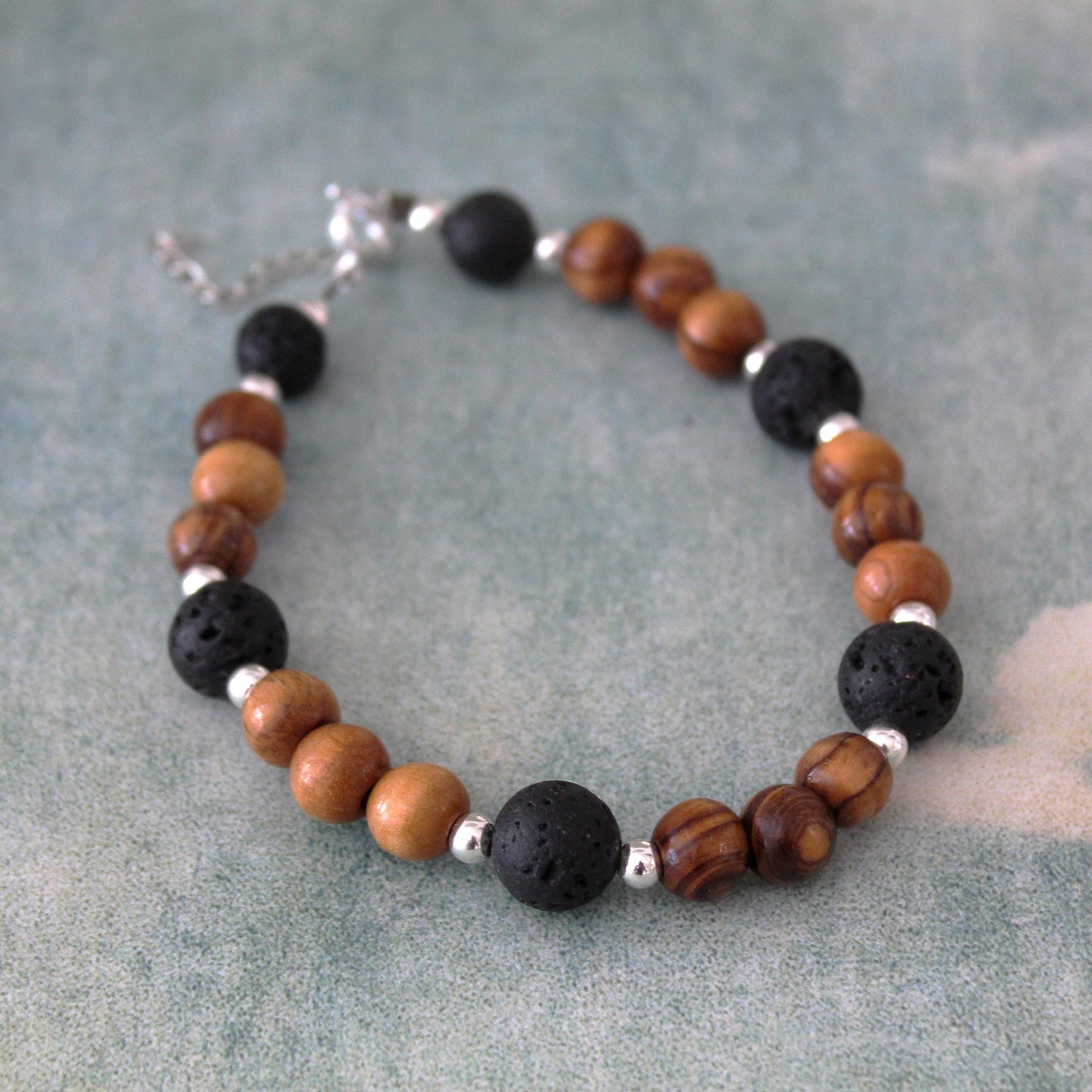 Olive Wood Beads & Black Volcanic Lava Stone Bracelet with Sterling Silver Accents - Handcrafted Statement Jewelry
