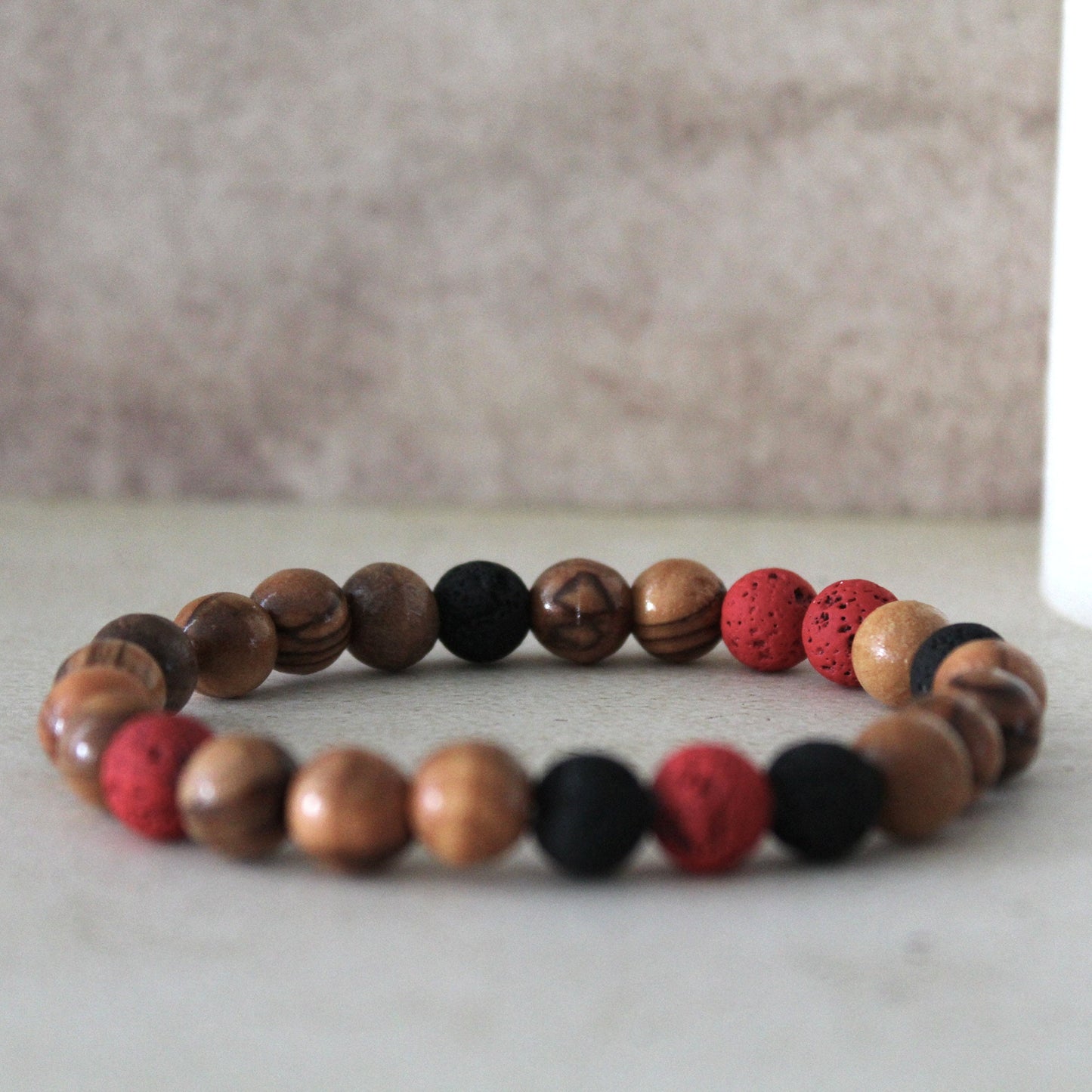 Handcrafted Hebrew Jewelry from Israel, Volcanic Lava Bracelet, Unisex Bracelet With Olive Wood Beads