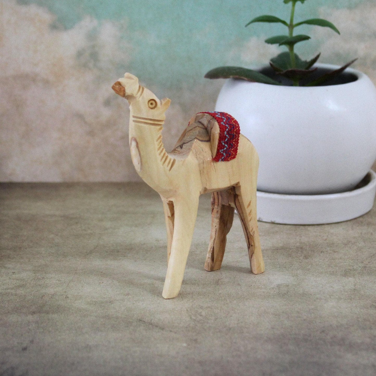 5.5" Olive Wood Camel Statue Hand Carved in the Holy Land Figurine Red Saddle. Handmade in the Holy Land, Jerusalem