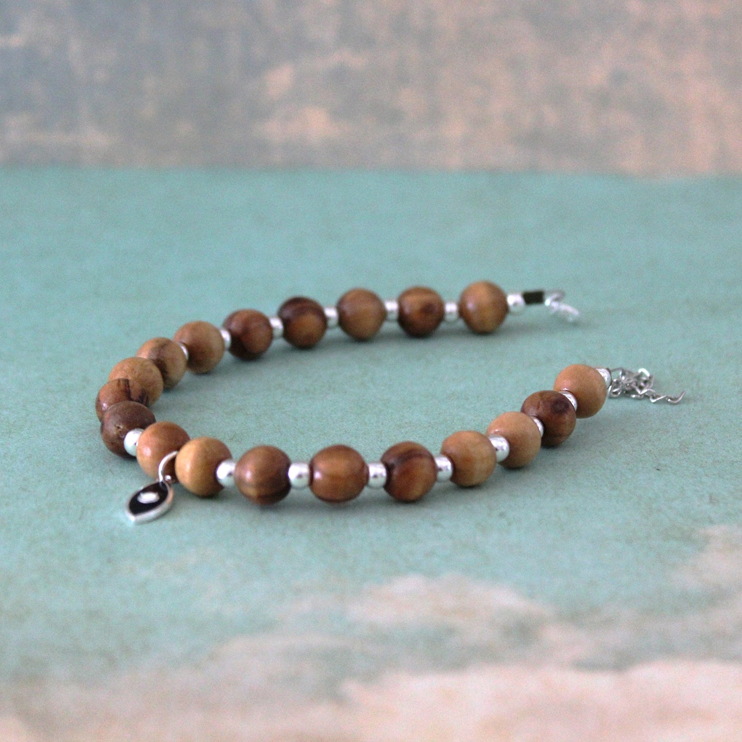 925 Silver and Olive Wood Beaded Bracelet with Black Fish Charm - Handcrafted Statement Jewelry