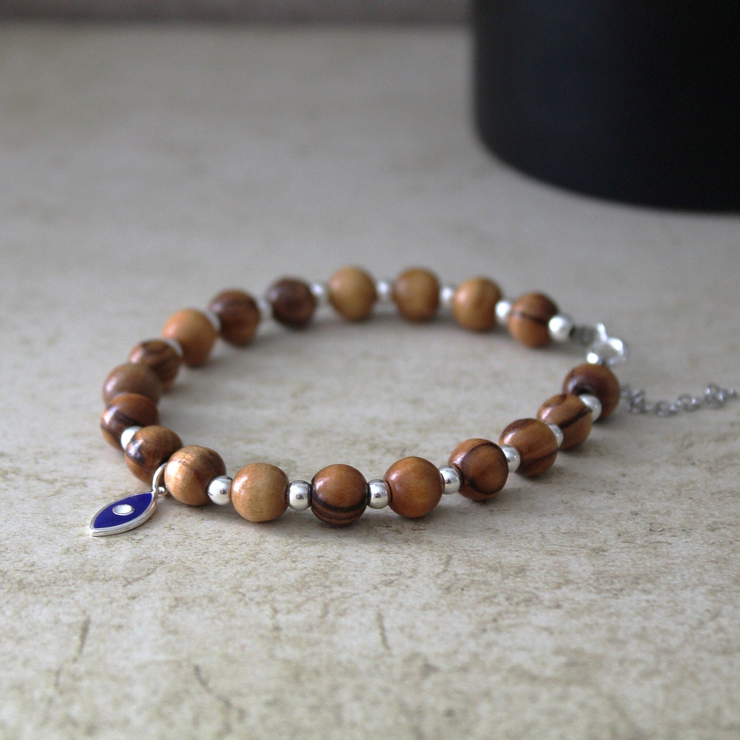 Divine Guardian: Handcrafted Lava Stone Bracelet with Enchanting Silver 925 Blue Fish Charm - A Fusion of Israeli and Christian Jewelry