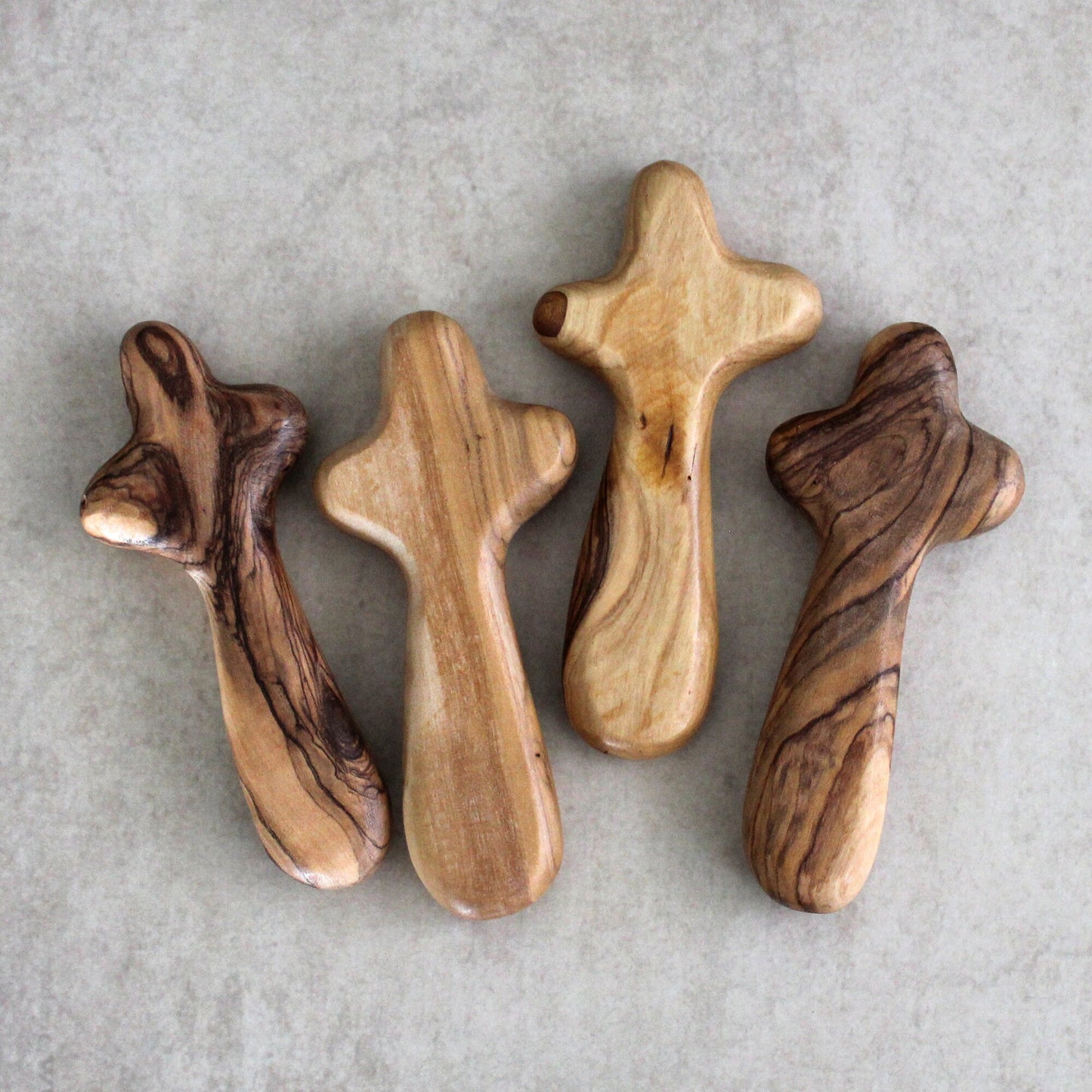 Bundle of 4 Handmade Comfort Crosses Also Called Palm Cross Made From Olive Wood in the Holy Land. Hand Carved Olive Wood Holding Crosses