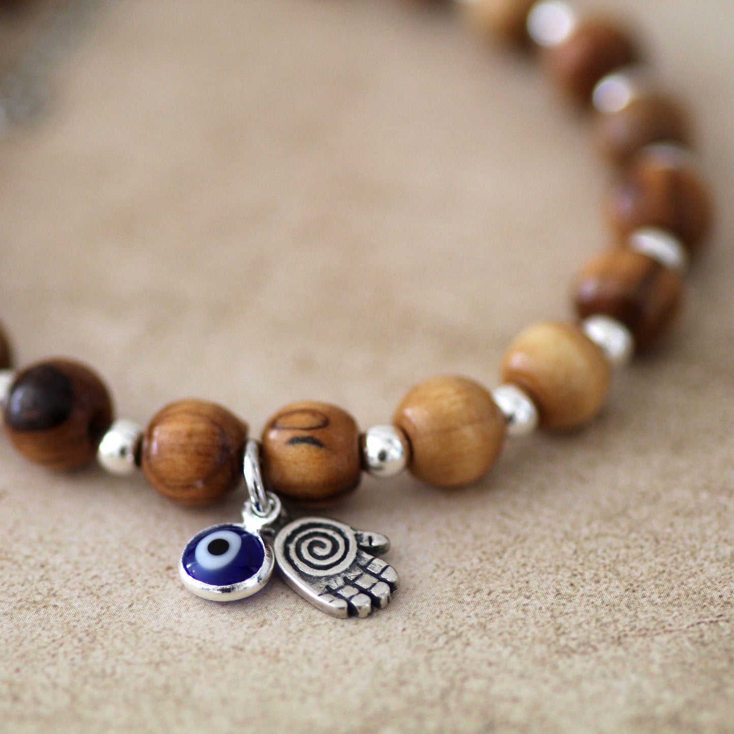 Sacred Sentinel: Artisan Evil Eye and Hamsa Hand Bracelet, a Symbolic Shield of Protection and Trendy Talisman Against Negativity